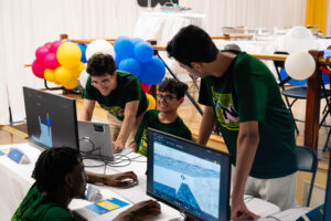 DDI students showcase their games to TYH instructors.