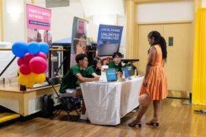 AMP students look on as a guest asks questions.