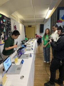 A student displays his prototype.