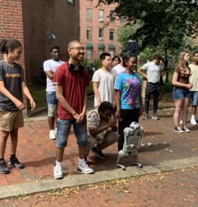 BDA students enjoy the antics of the robot dog.