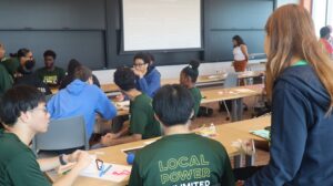 Students collaborate to make innovation designs.