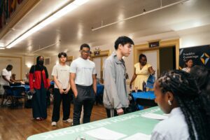 Students sign-in for their first day.